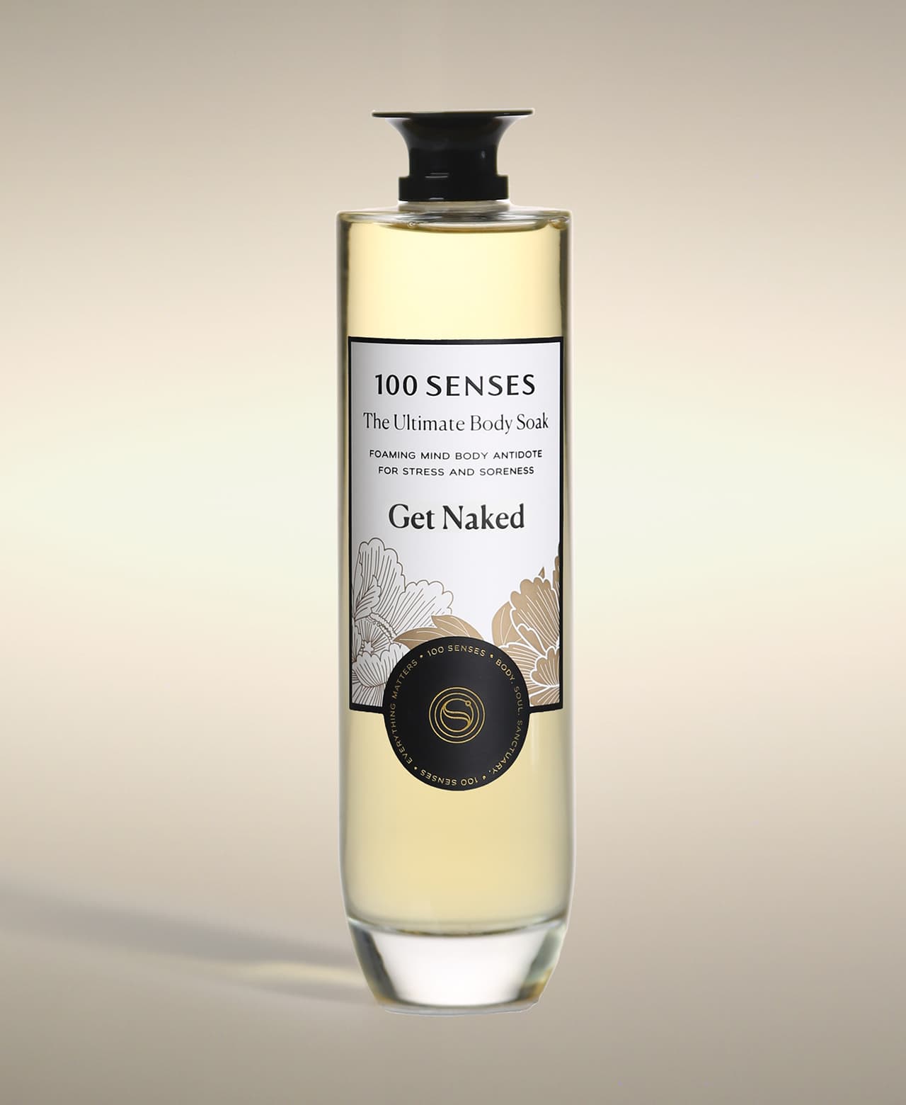 Get Naked Ultimate Body Soak in a thick-bottomed glass bottle with botanical label artwork.