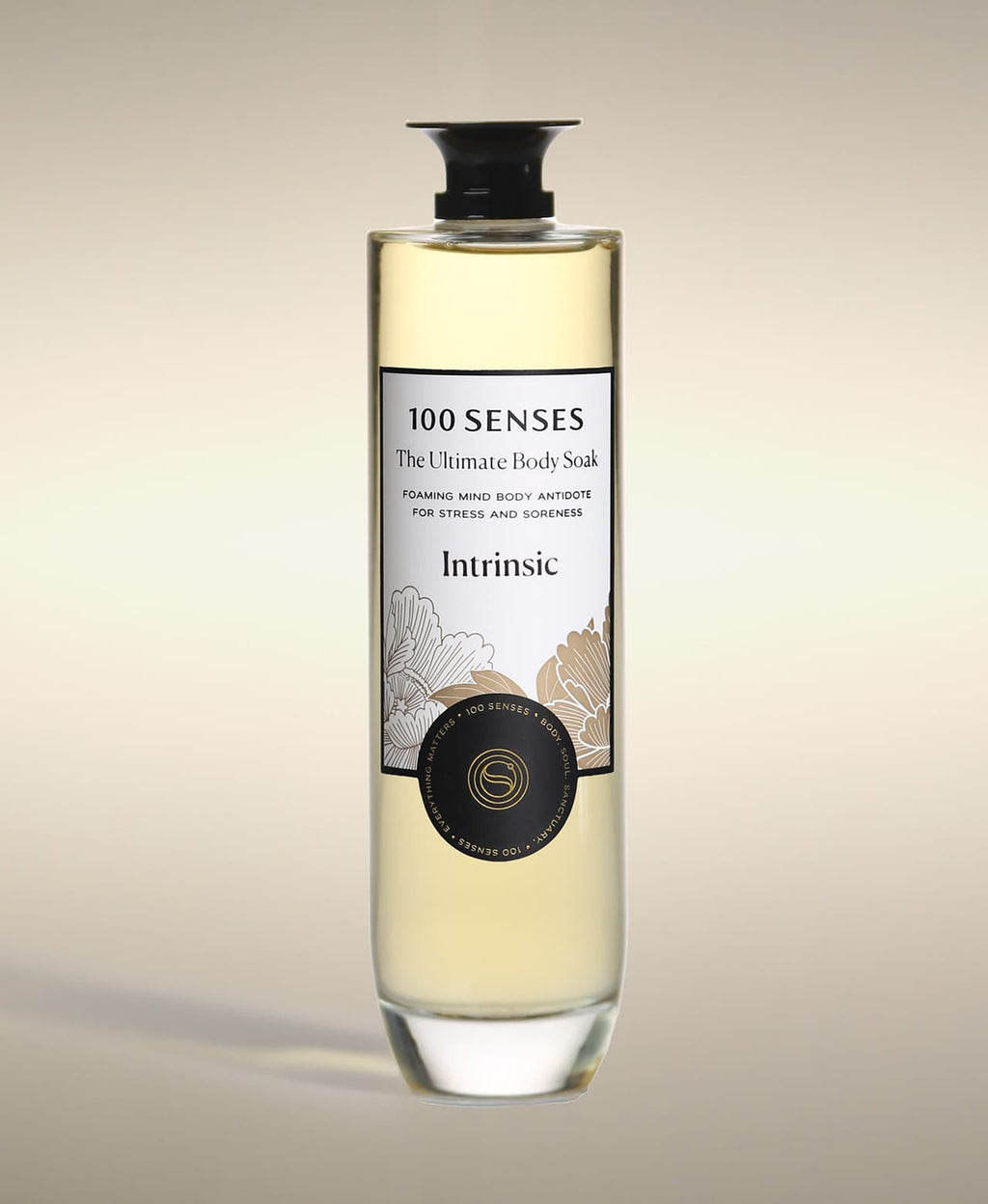 Intrinsic Ultimate Body Soak in a thick-bottomed glass bottle botanical label artwork.