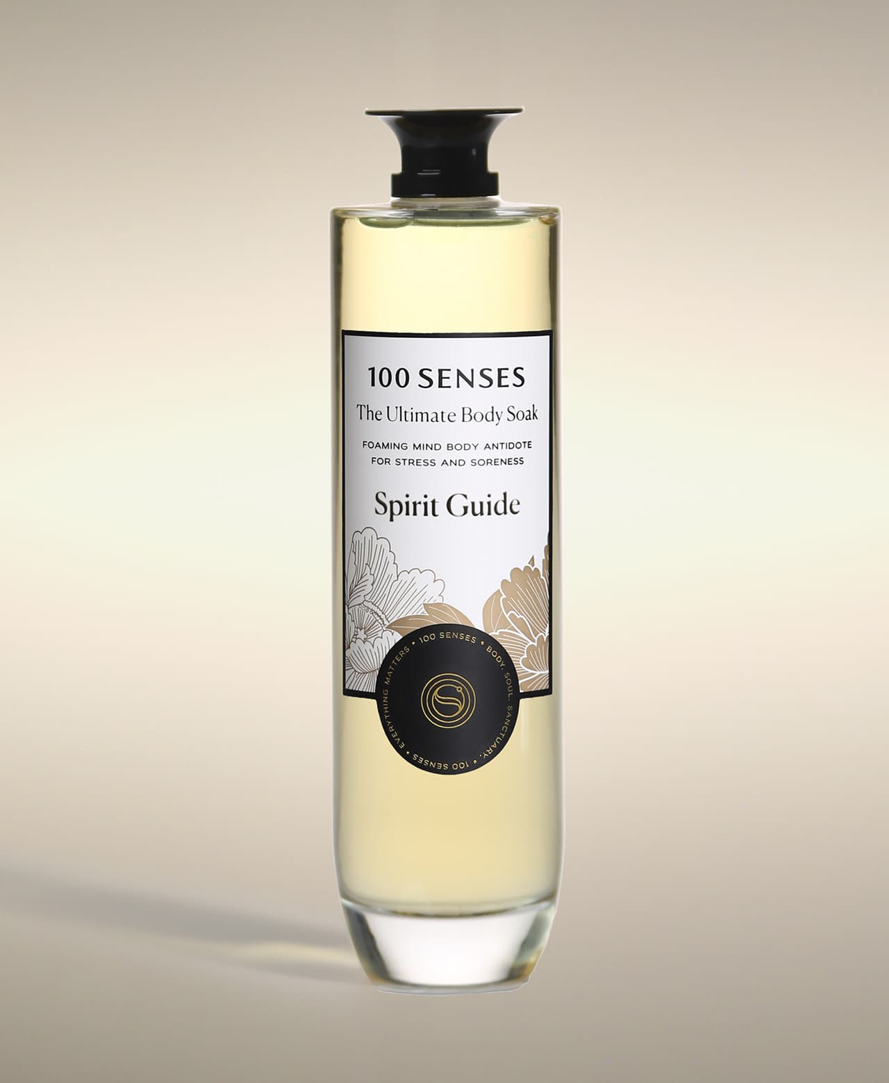 Spirit Guide Ultimate Body Soak in a thick-bottomed glass bottle with botanical label artwork.
