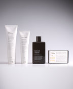 Body polish, face polish, body whip and a This Is Not Soap Ultimate Body Bar arranged together.