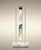 Tranquilizer glass Cylinder Soak displayed in the Single Cylinder Soak Stand in gold-and-marble.