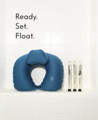 Ready Set Float Kit with blue Head Floater and the Trio 1 Foaming Bath Soak glass cylinders.