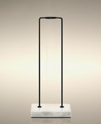 Empty Single Cylinder Soak stand in black-and-marble.
