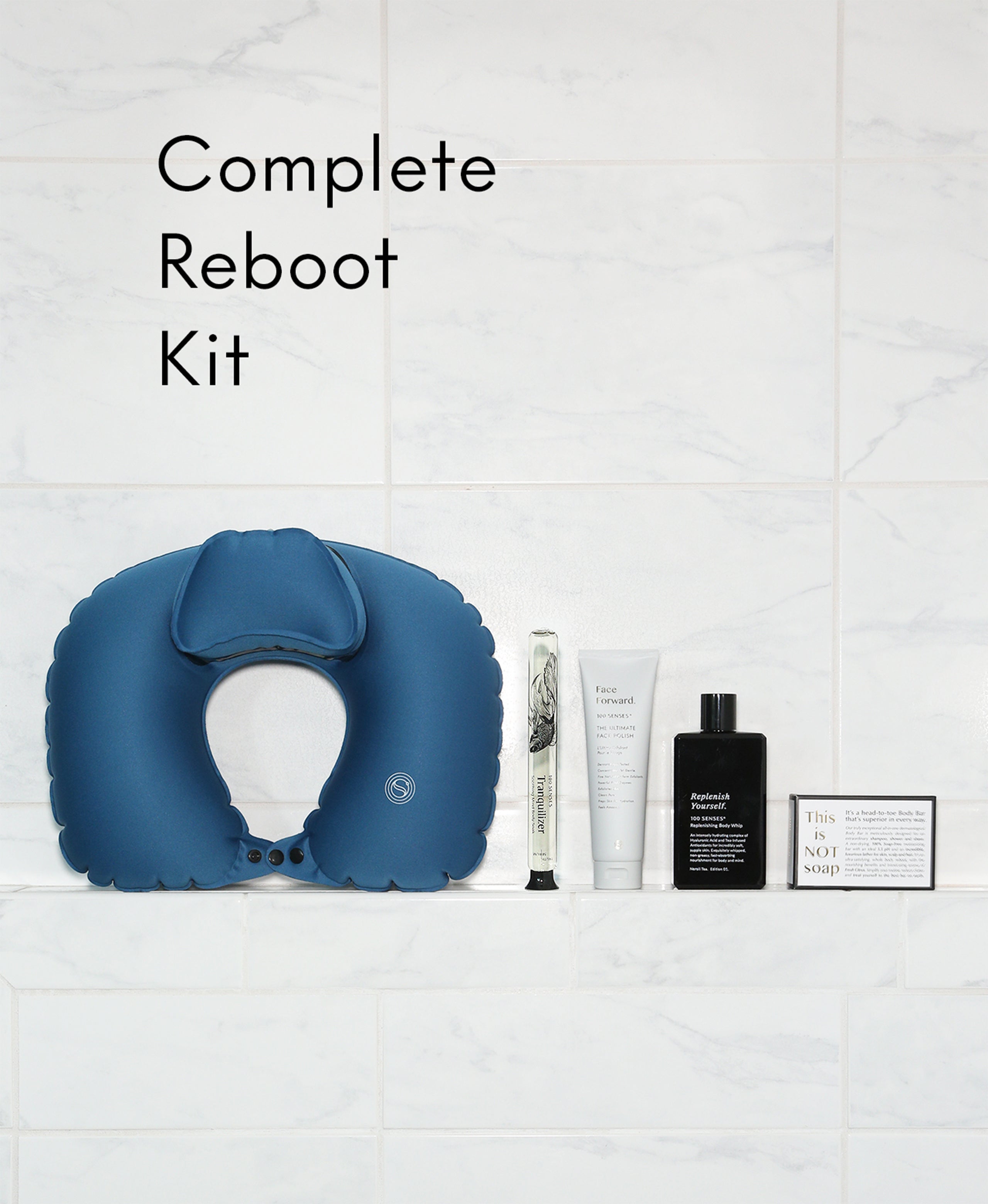 Complete Reboot Kit with a blue Head Floater, a foaming cylinder soak, the Face Forward Face Polish, a Replenish Yourself Body Whip and the Ultimate Body Bar.