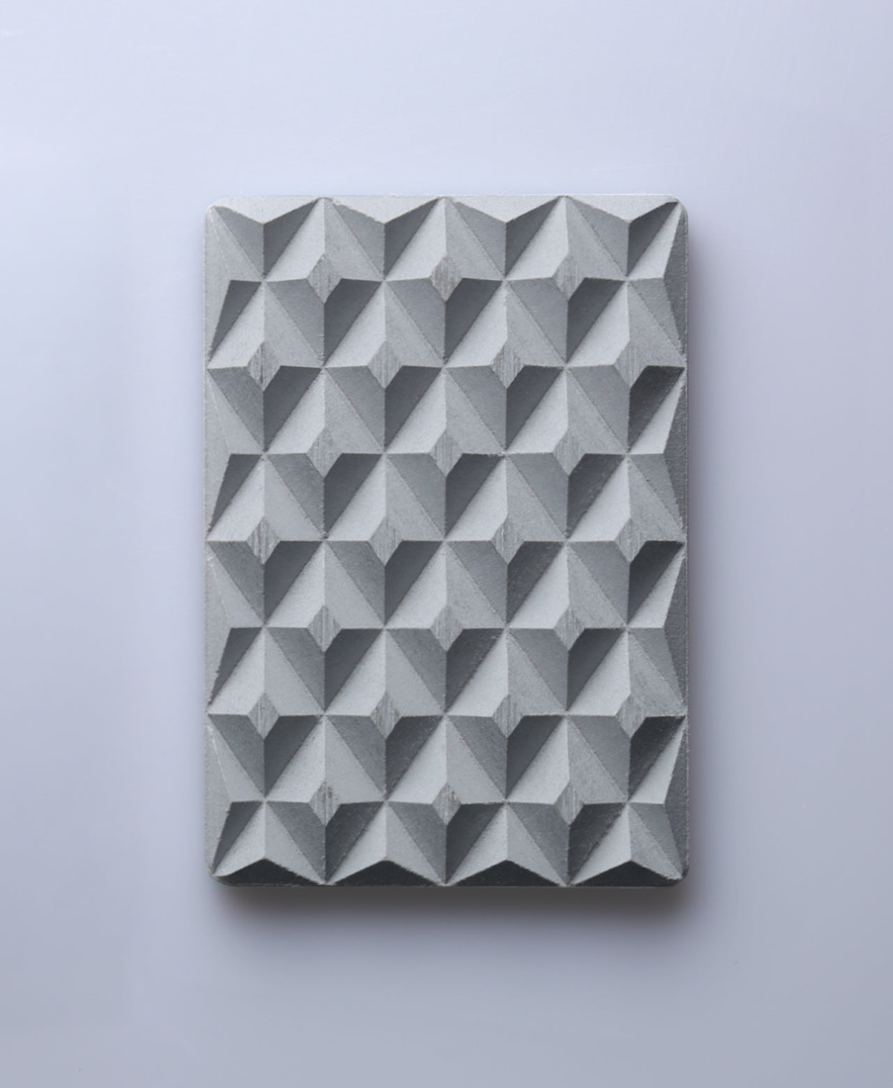 Stone-gray 3D Pyramid Body Bar Rest with a faceted pyramid pattern.