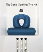 Sonic Soaking Trio Kit with BathSonic earbuds, blue Float Duo and Trio 1 Foaming Bath Soaks in glass cylinders.