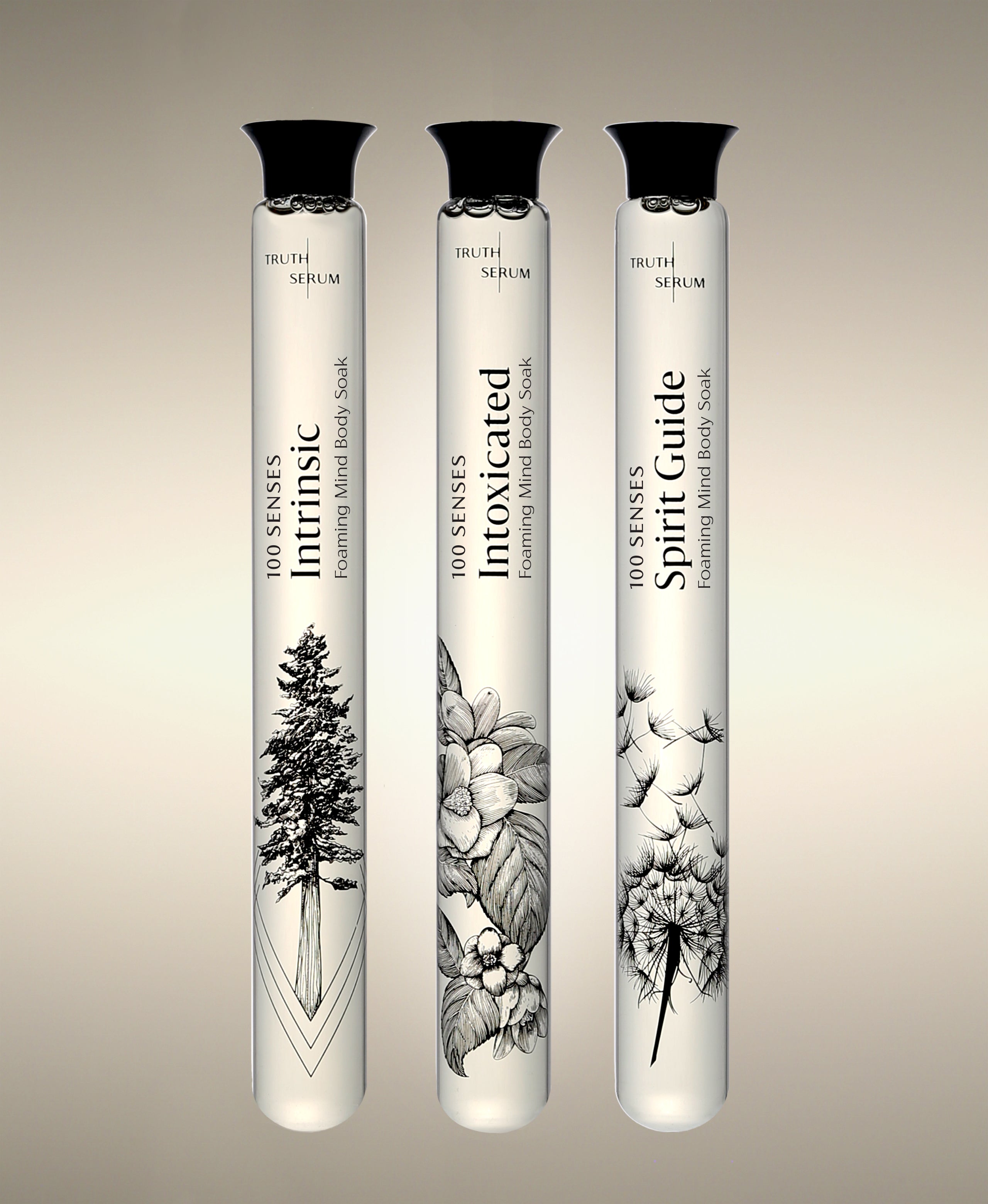 Intrinsic, Intoxicated and Spirit Guide Foaming Bath Soak glass cylinders.