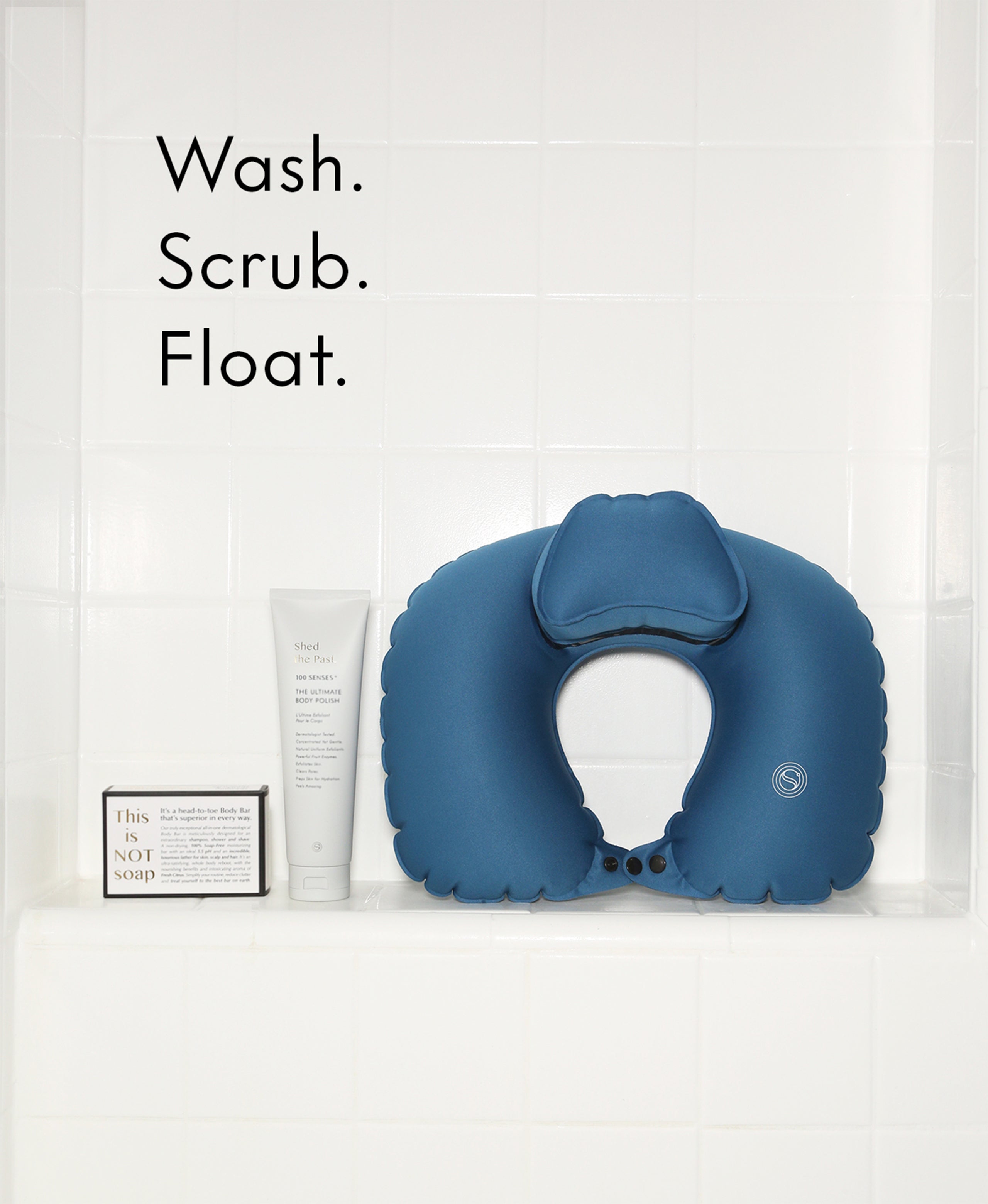 Wash. Scrub. Float. kit with the Ultimate Body Bar, body polish and blue Head Floater.