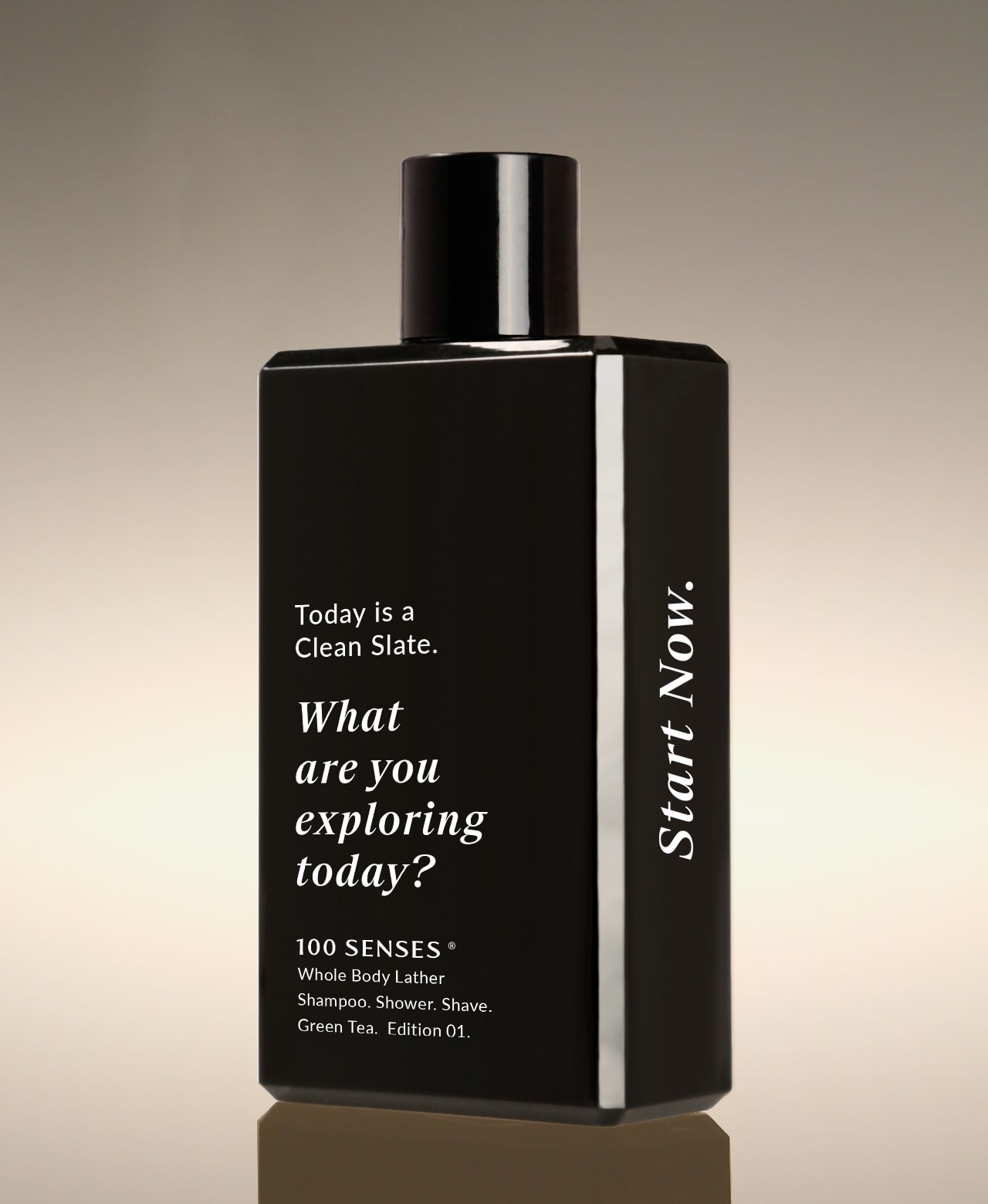 Clean Slate Body Lather Green Tea bottle angled beside its carton, reading “What are you exploring today?” on the front and “Start Now.” on the side.
