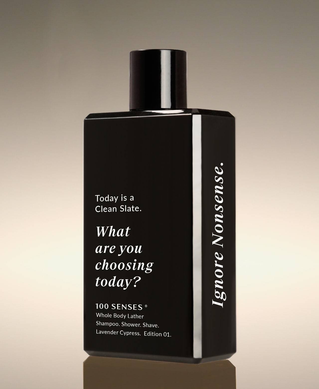 Lavender Cypress Clean Slate Whole Body Lather bottle angled to show “Ignore Nonsense.” along the side.