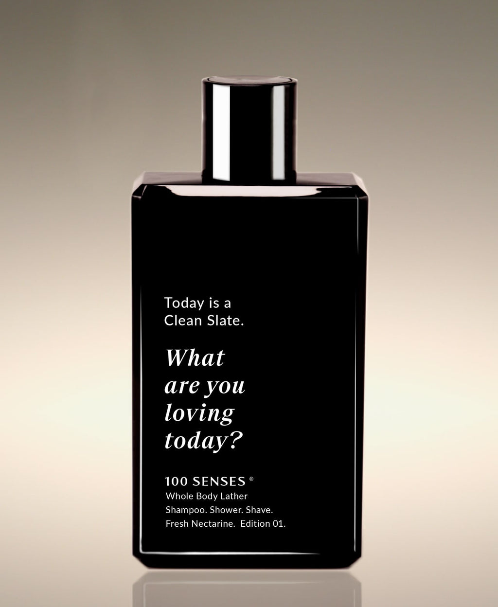 Front view of the Fresh Nectarine Clean Slate Body Lather bottle reading “What are you loving today?”