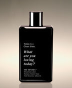 Front view of the Fresh Nectarine Clean Slate Body Lather bottle reading “What are you loving today?”