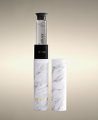 Open glass Cylinder Soak Travel Case holding a Tranquilizer soak cylinder beside its lid.