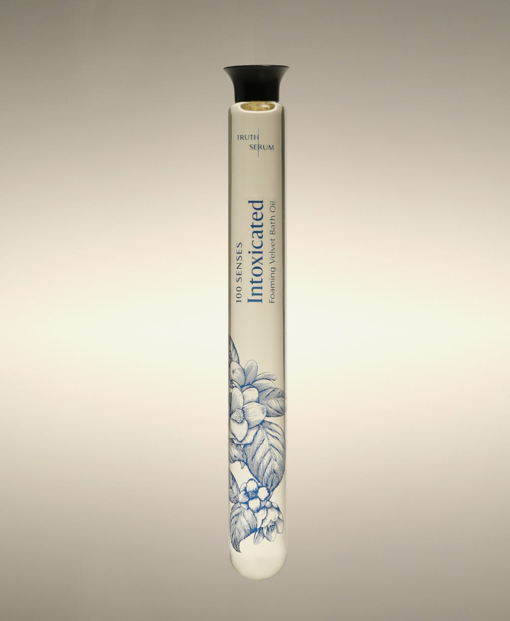 Intoxicated White Tuberose Soothing Cylinder Bath Oil glass cylinder with floral line-art illustration.