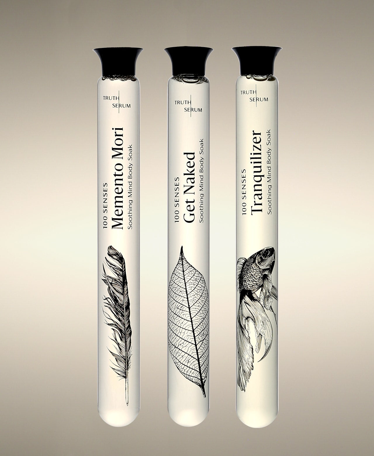 Memento Mori, Get Naked and Tranquilizer glass Foaming Cylinder Soaks with illustrated labels.