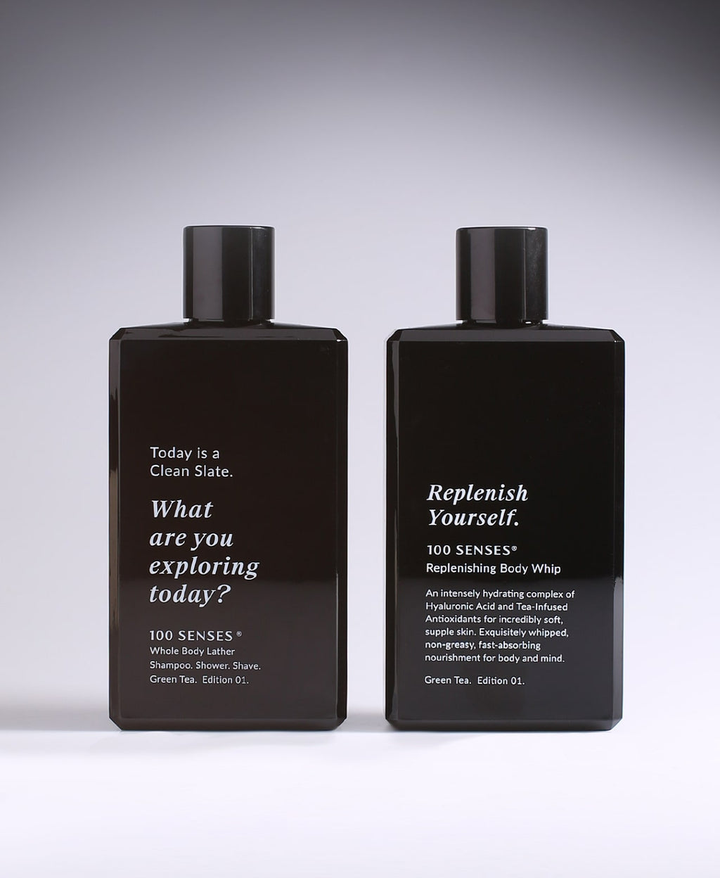 Clean Slate Body Lather and Replenish Yourself Body Whip bottles side by side.