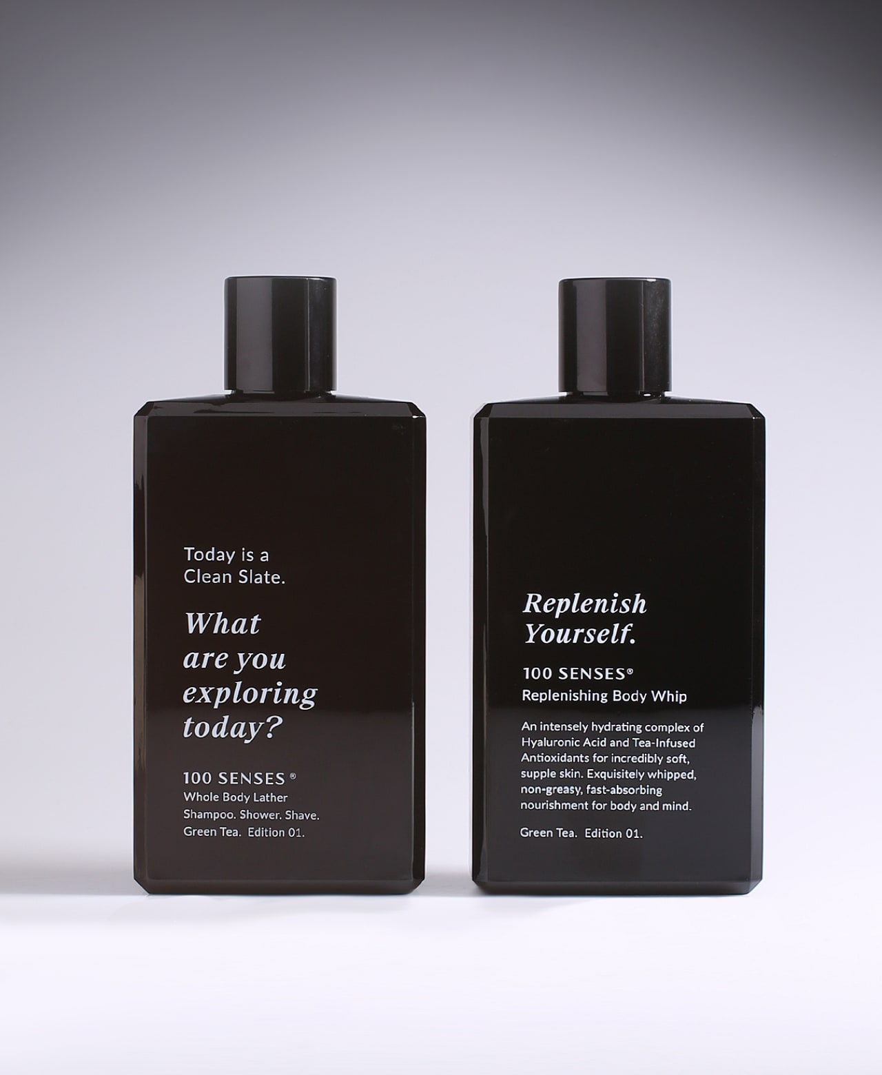 Clean Slate Body Lather and Replenish Yourself Body Whip bottles side by side.