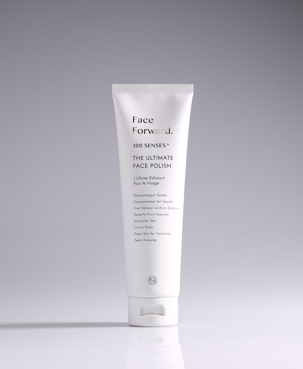Face Forward Ultimate Face Polish tube standing against a pale gradient gray background.