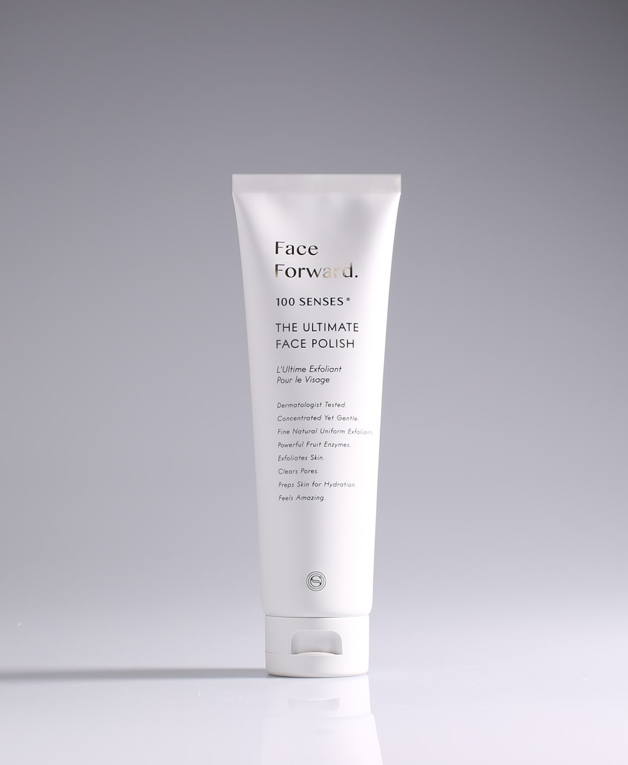 Face Forward Ultimate Face Polish tube standing against a pale gradient gray background.