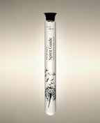 Spirit Guide Vetiver Agarwood glass Foaming Cylinder Soak with an illustration of dandelion seeds drifting from the seed head.