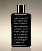 Back view of the Neroli Leaf Clean Slate Body Lather bottle, with a shower thought beginning “Sometimes life is about risking everything for a dream no one can see but you.”