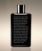 Back view of the Neroli Leaf Clean Slate Body Lather bottle, with a reflection beginning “Sometimes life is about risking everything for a dream no one can see but you.”