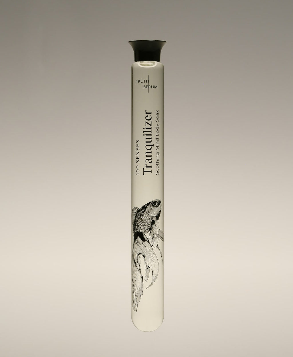 Tranquilizer Lavender Cypress Foaming Bath Soak glass cylinder in a betta fish illustrated tube.