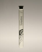 Tranquilizer Lavender Cypress Foaming Bath Soak glass cylinder in a betta fish illustrated tube.