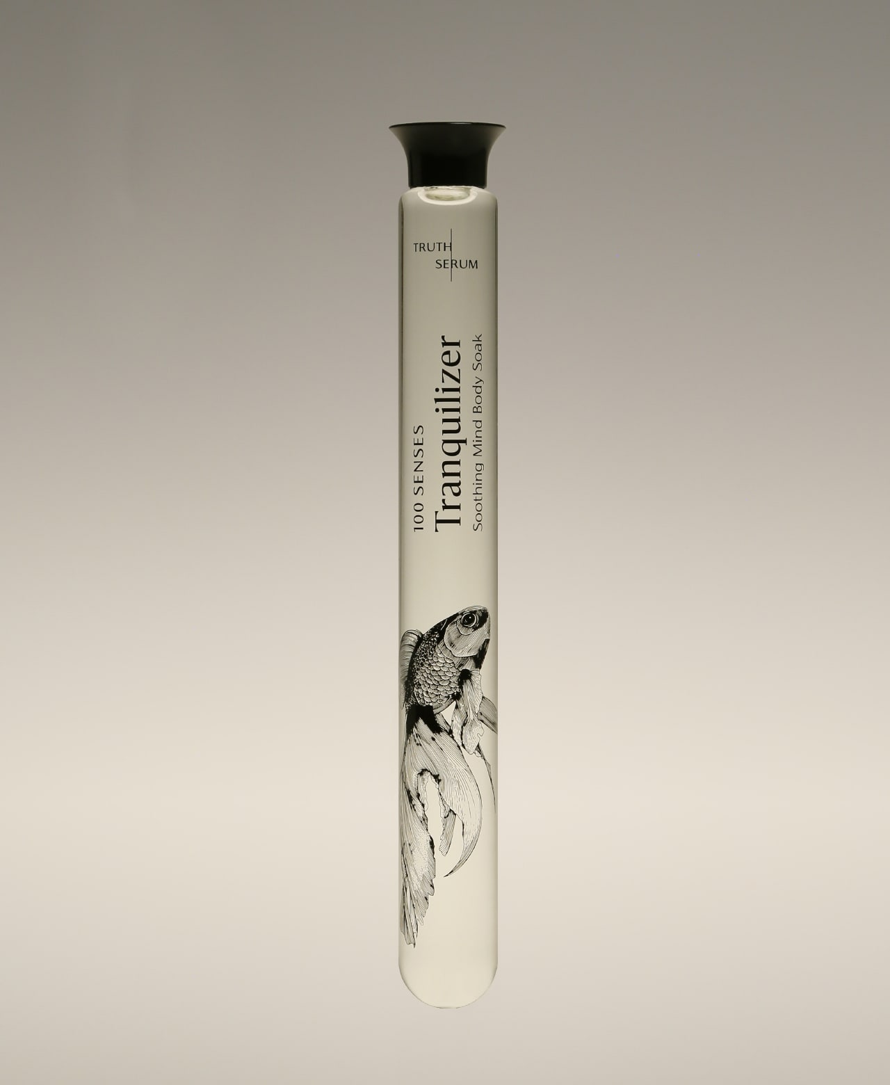 Tranquilizer Lavender Cypress Foaming Bath Soak glass cylinder in a betta fish illustrated tube.