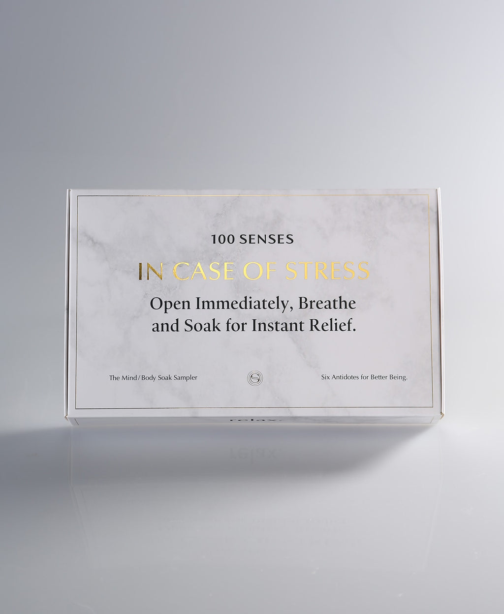 Closed Mind/Body Soak Sampler box reading “IN CASE OF STRESS: Open Immediately, Breathe, and Soak for Instant Relief.”