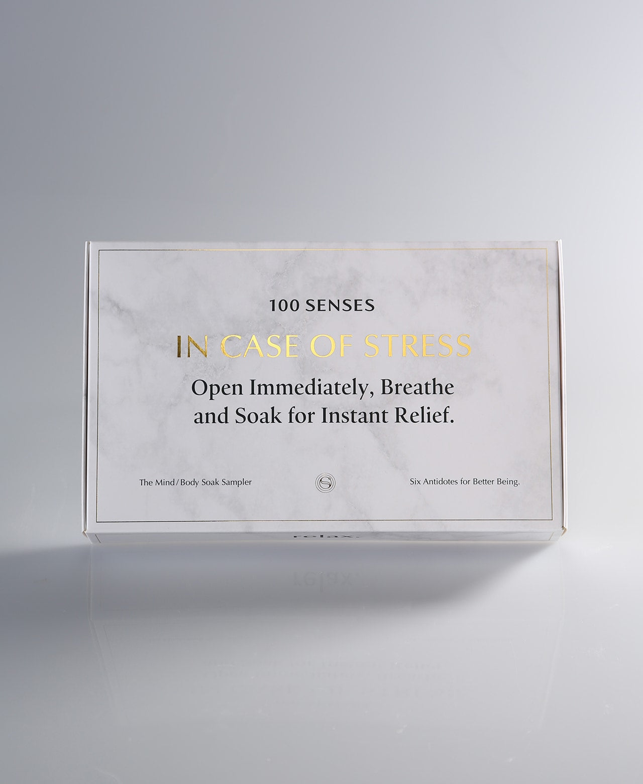Closed Mind/Body Soak Sampler box reading “IN CASE OF STRESS: Open Immediately, Breathe, and Soak for Instant Relief.”