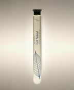 Get Naked Fresh Roses Soothing Cylinder Bath Oil glass cylinder with a vein leaf line-art illustration.
