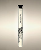 Tranquilizer Foaming Bath Soak glass cylinder with betta fish illustration.