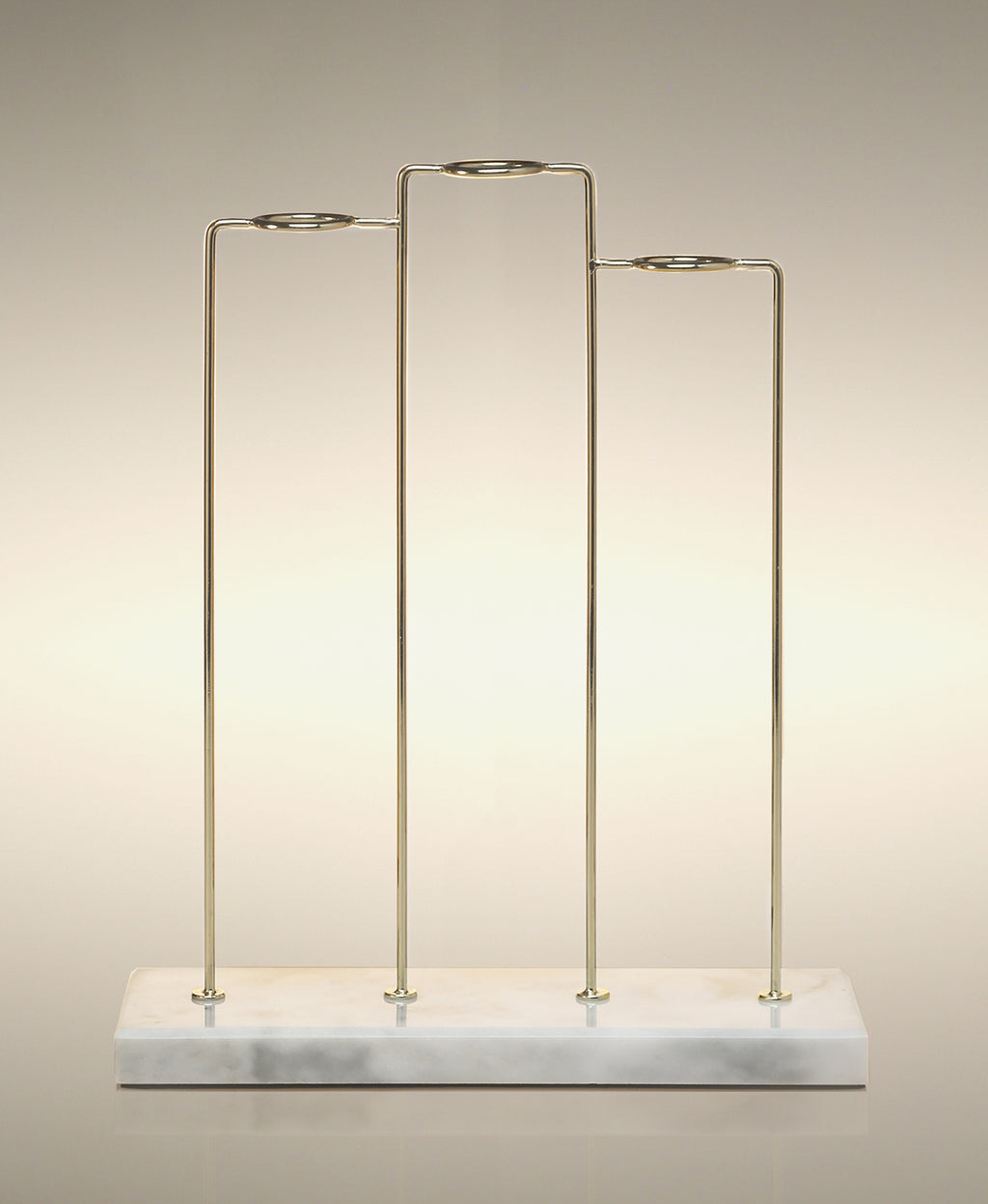 Empty gold and white marble Trio glass Cylinder Soak Stand.