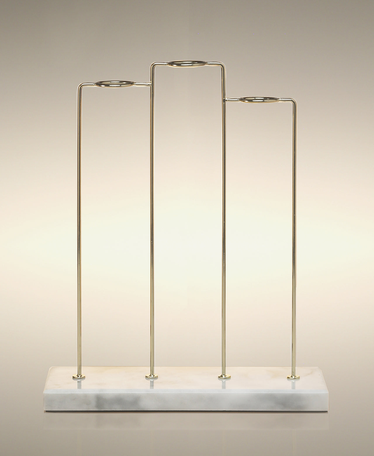 Empty gold and white marble Trio glass Cylinder Soak Stand.
