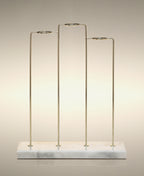 Empty gold and white marble Trio glass Cylinder Soak Stand.